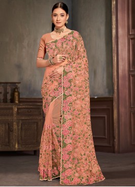 Aristocratic Net Peach and Rust Trendy Saree