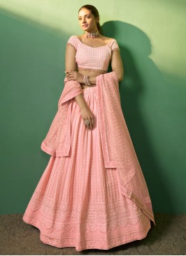 Auspicious Peach Georgette Designer Lehenga Choli