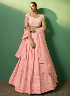 Auspicious Peach Georgette Designer Lehenga Choli