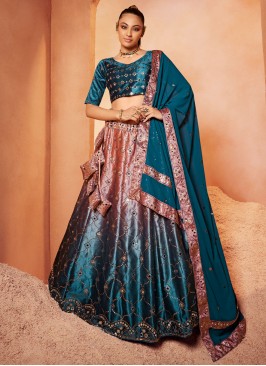 Beckoning Velvet Pink and Teal Embroidered Designer Lehenga Choli