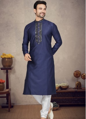 Navy Blue Jaquard Kurta with Off White Churidar Bottoms.