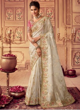 Blissful Border Off White Georgette Traditional Saree