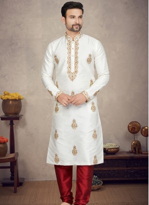 Off-White Art silk Kurta with Marron Churidar Bottoms.