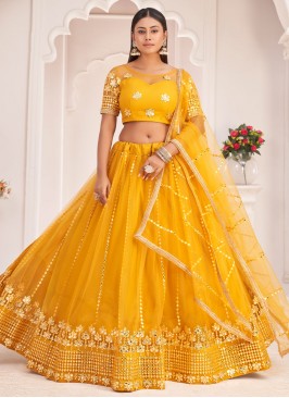 Breathtaking Mustard Net Lehenga Choli