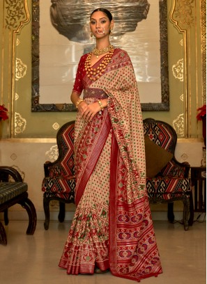 Charismatic Beige Patola Print Contemporary Saree