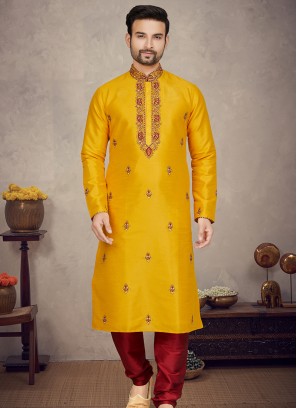 Mango Art silk Kurta with Marron Churidar Bottoms.