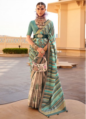 Compelling Turquoise Printed Trendy Saree