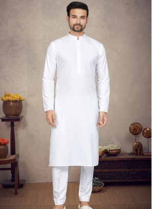 White Cotton Kurta and Trouser Ensemble.