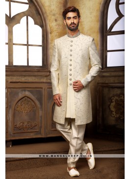 Cream Navabi Indo Western Embroidered Art Banarasi Silk Sherwani with Art Silk Aligadhi Bottom.