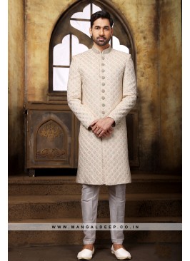 Cream Navabi Indo Western Embroidered Georgette Sherwani with Art Silk Aligadhi Bottom.