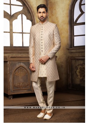 Cream & Peach Navabi Indo Western Embroidered Art Banarasi Silk Sherwani with Art Silk Aligadhi Bottom.