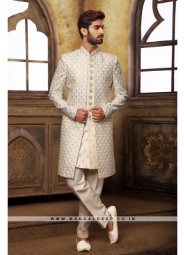 Cream & Sky Navabi Indo Western Embroidered Art Banarasi Silk Sherwani with Art Silk Aligadhi Bottom.