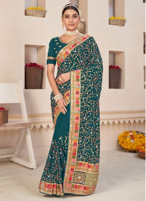 Dashing Embroidered Faux Georgette Teal Classic Saree