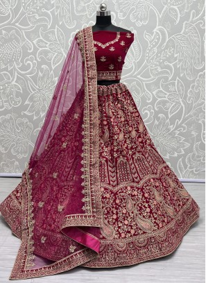 Embroidered Velvet Lehenga Choli in Rani