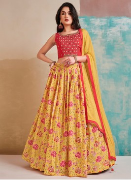 Enchanting Yellow and Red Designer Party Wear Heavy Chinon Lehenga Choli