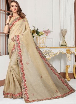 Eye-Catchy Zari Cream Trendy Saree