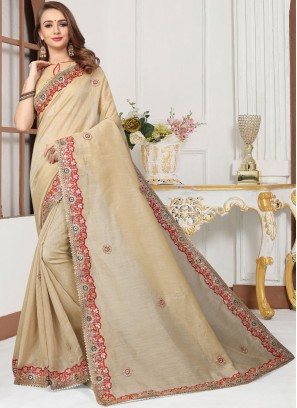 Eye-Catchy Zari Cream Trendy Saree