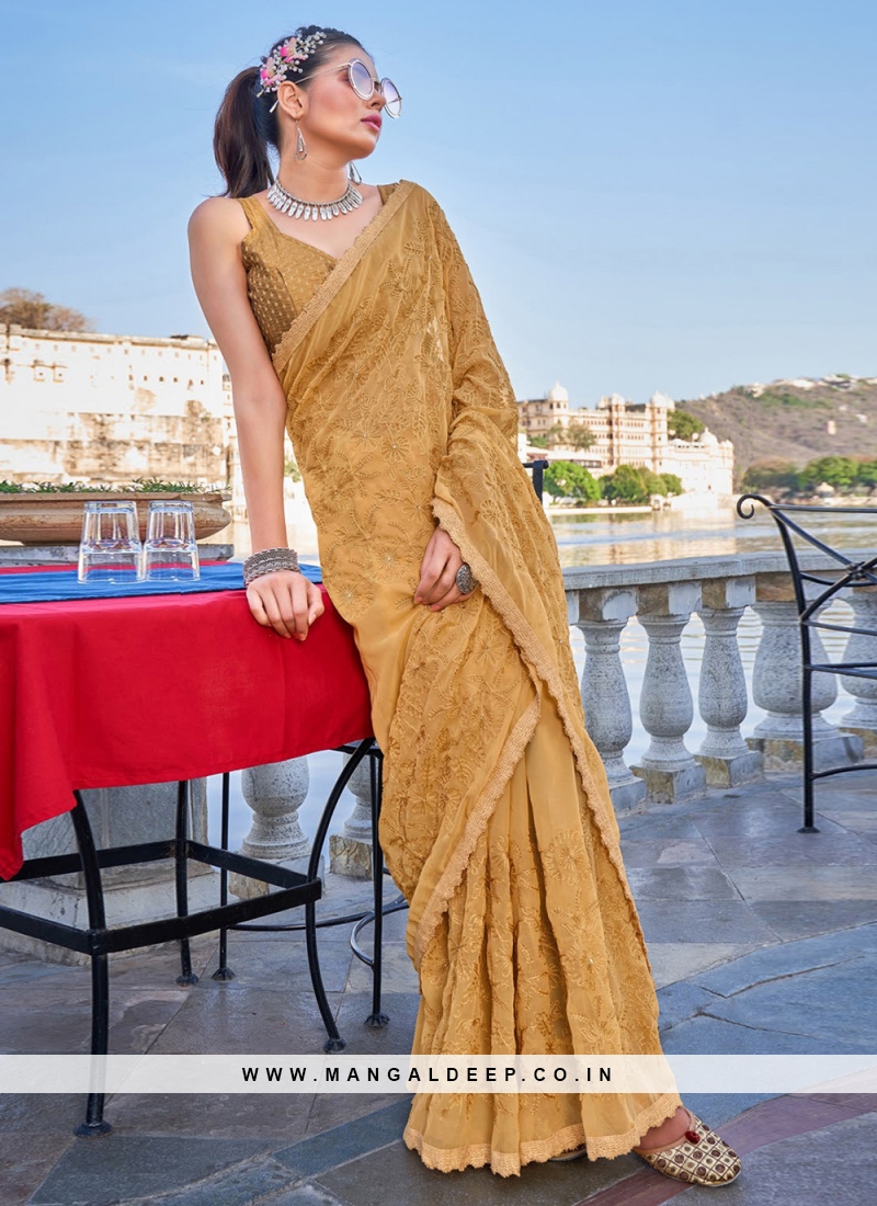 Fabulous Georgette Mustard Embroidered Contemporary Saree