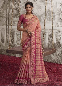 Fancy Fabric Embroidered Peach and Rani Designer Saree