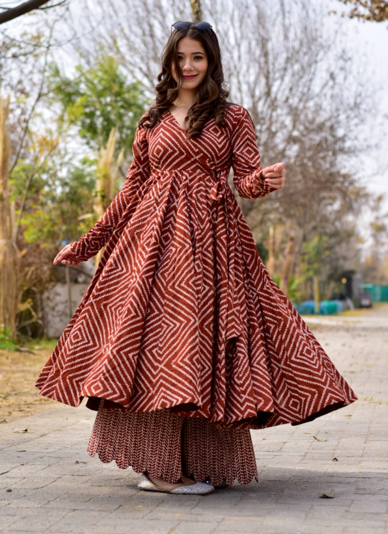 Chiku Color Weaving Zari Work Silk Gown - ClothsVilla.com