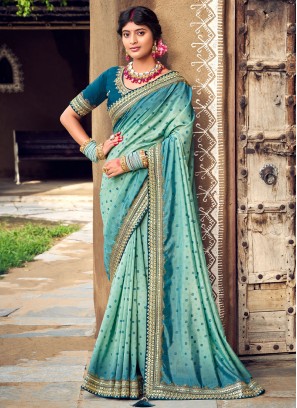 Genius Turquoise Swarovski Bandhani Saree