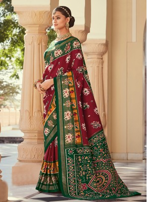 Hypnotic Green and Maroon Patola Print Silk Saree