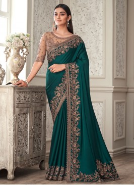 Impeccable Silk Teal Embroidered Traditional Saree