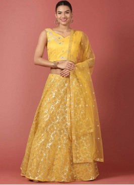 Innovative Embroidered Net Mustard Lehenga Choli