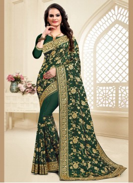 Intriguing Satin Silk Green Traditional Saree