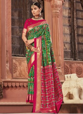 Irresistible Patola Print Green and Hot Pink Silk Trendy Saree