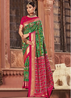 Irresistible Patola Print Green and Hot Pink Silk Trendy Saree