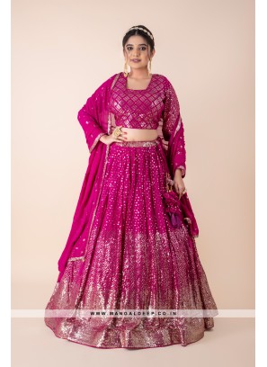 Lovely Magenta Sequins & Embroidered Georgette Lehenga Choli