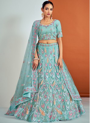 Lovely Turquoise Soft Net Lehenga Choli with Sequence and Thread Work.