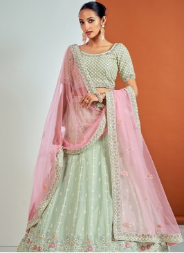 Lovely Pista Green Georgette Lehenga Choli with Sequence and Thread Work.