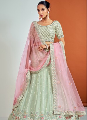 Lovely Pista Green Georgette Lehenga Choli with Sequence and Thread Work.