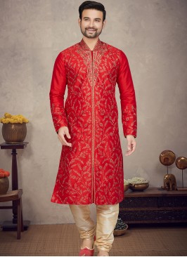 Marron Art silk Kurta with Gold Churidar Bottoms.