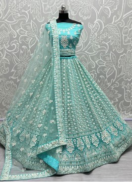 New and Unique Turquoise Wedding Lehenga Choli with Intricate Embellishments.