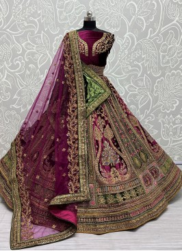 New and Unique Purple Wedding Lehenga Choli with Intricate Embellishments.