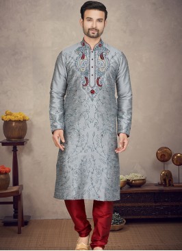 Grey Art silk Kurta with Marron Churidar Bottoms.