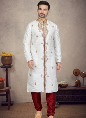 Off-White Art silk Kurta with Marron Churidar Bottoms.