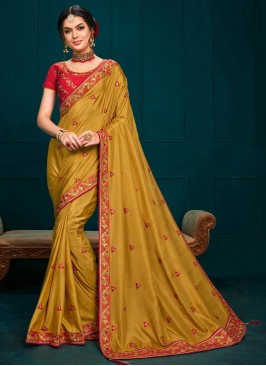 Party Wear Embroidered Saree In Mustard Color
