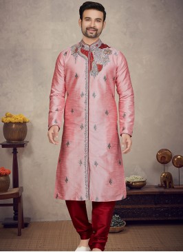 Pink Art silk Kurta with Marron Churidar Bottoms.