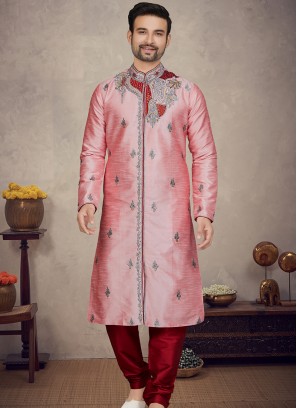 Pink Art silk Kurta with Marron Churidar Bottoms.