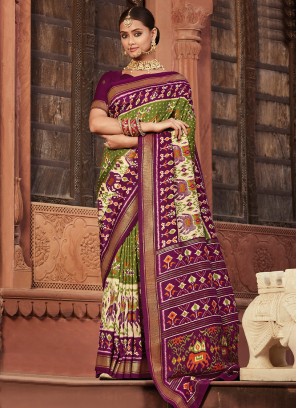 Pleasing Silk Green and Purple Patola Print Contemporary Saree