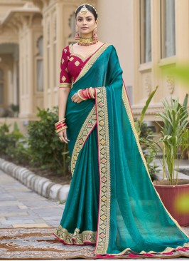 Refreshing Border Silk Morpeach  and Teal Traditional Saree