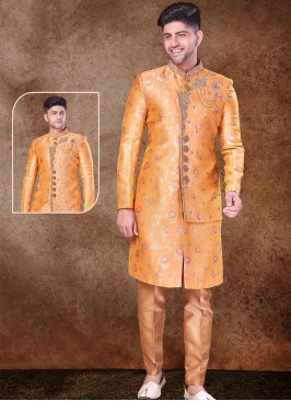 Regal Orange and Chikoo Sherwani with Jaqard Top and Dhupion Silk Bottom.