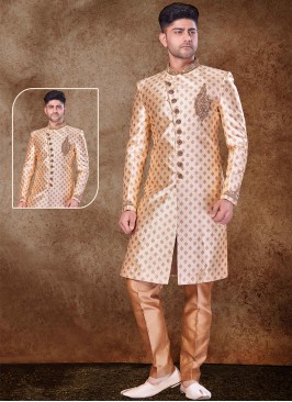 Regal Gold and Chikoo Sherwani with Jaqard Top and Dhupion Silk Bottom.