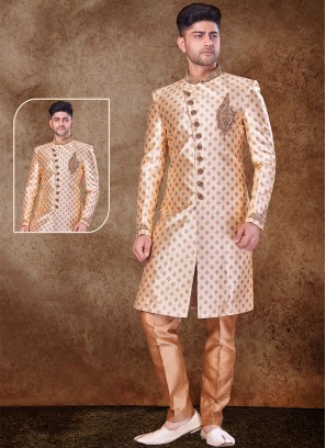 Regal Gold and Chikoo Sherwani with Jaqard Top and Dhupion Silk Bottom.