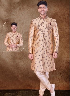 Regal Onion and Cream Sherwani with Jaqard Top and Dhupion Silk Bottom.