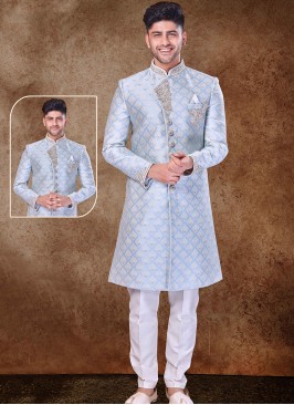 Regal Sky Bllue and Off White Sherwani with Jaqard Top and Dhupion Silk Bottom.